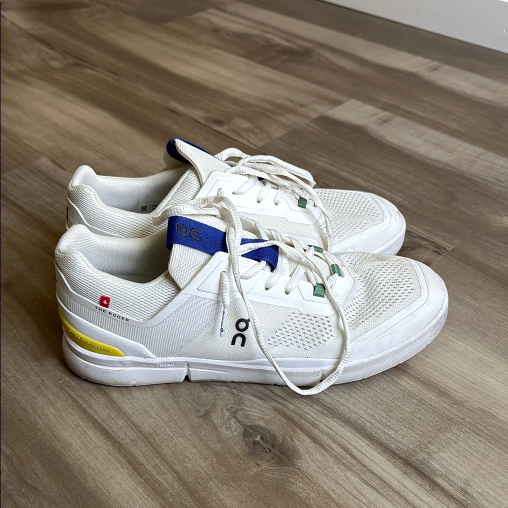 On Running White and Blue Sneakers with Minimalist Design